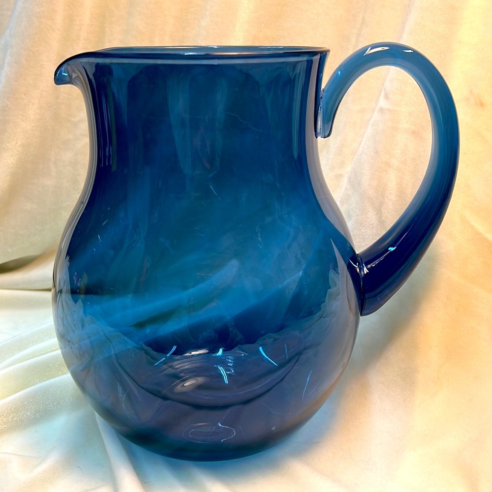Acrylic teal blue vintage large pitcher pre owned Holds about a gallon.